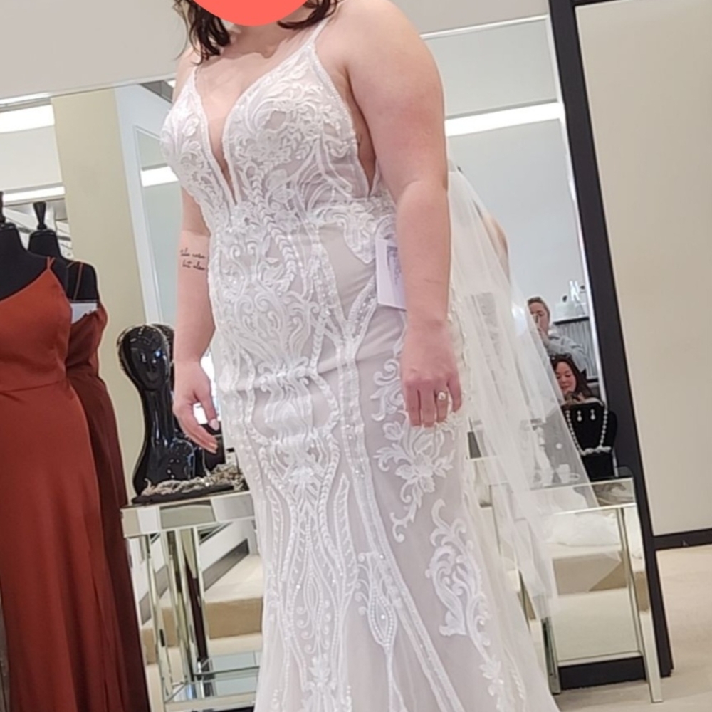 White Plunge Neck Wedding Gown